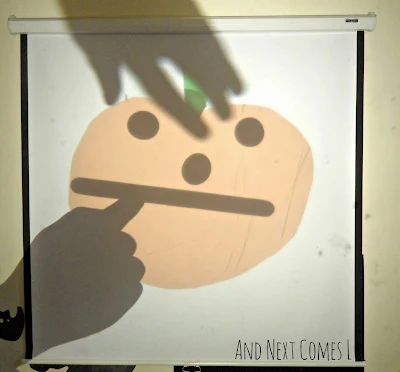 Making jack-o-lanterns on the overhead projector from And Next Comes L