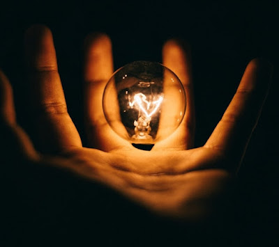 Hand holding lightbulb (Credit: Rohan Makhecha/Unsplash)