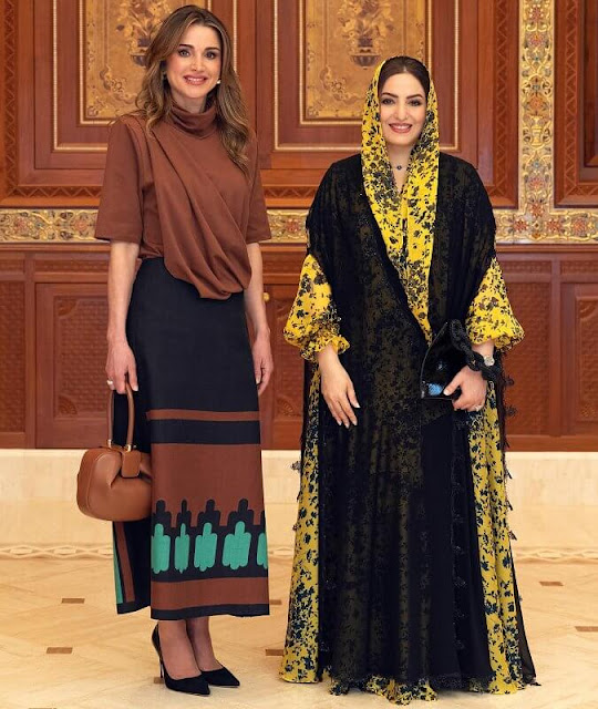 Queen Rania wore a floral-embroidered polka-dot midi dress by Giambattista Valli. Johanna Ortiz Lucid top and midi skirt