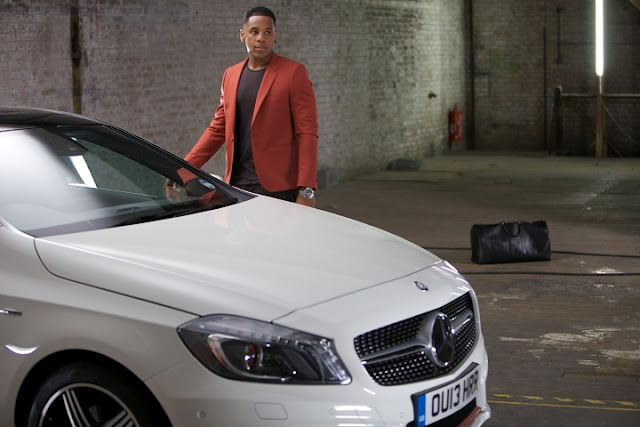 Reggie Yates and a white Mercedes-Benz A250 during Mercedes-Benz Fashion Week London