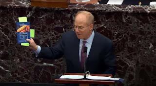 In a screenshot from a webcast by congress.gov, David Sean, the defense attorney for former President Donald Trump, holds a copy of the 2021 Constitution in Washington on the first day of former President Donald Trump's second impeachment hearing on Feb.9 in the US Capitol, DC. The Home Impeachment manager will prove Trump is "fully responsible" for the January 6 attacks on the US Capitol, and he should be convicted and banned from public office. (Getty Images)