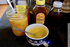 Honey mixed with orange, lemon, ginger and turmeric makes a yummy drink to soothe a sore and scratchy throat.