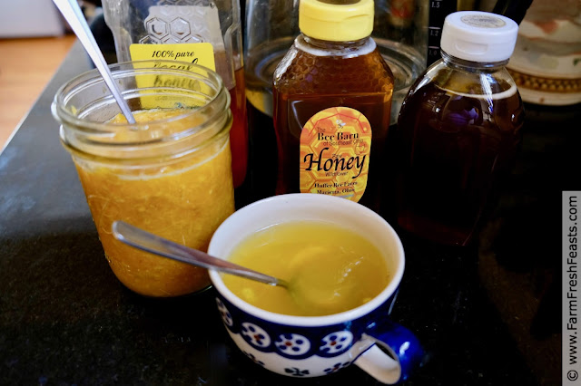 Honey mixed with orange, lemon, ginger and turmeric makes a yummy drink to soothe a sore and scratchy throat.