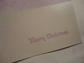 Purple embossed Merry Christmas sentiment