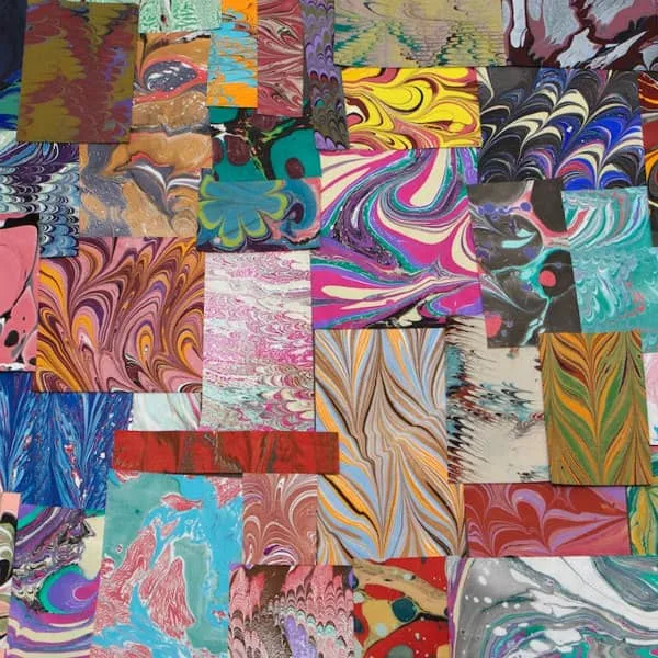 small squares and rectangles of colorful marbled papers