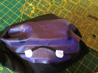 A purple hippo mask