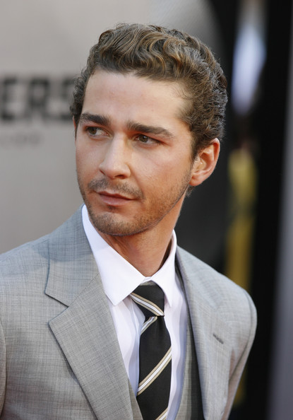 Writing Tattoo On Rib Cage. shia labeouf tattoo rib cage.