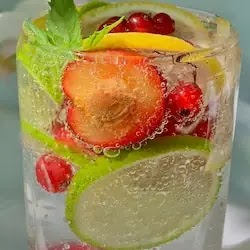 detoxification process. Carbonated Drink Full of Fruits Slices