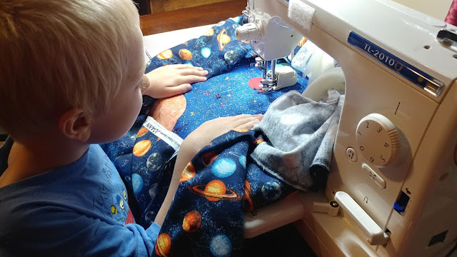 Outer space quilt by six year old boy