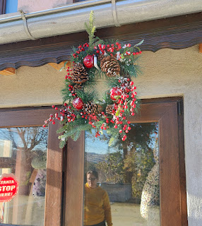 The wreath is hung from a bracket