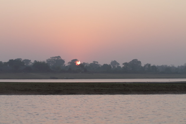 Sunrise over the Kabini Reservoir as seen during a morning boat safari