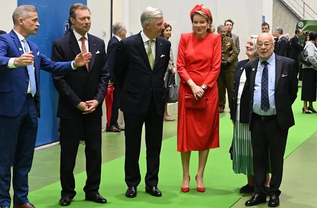 Queen Mathilde wore a red dress by Natan, Grand Duchess Maria Teresa wore a green belted jacket by Alexander McQueen