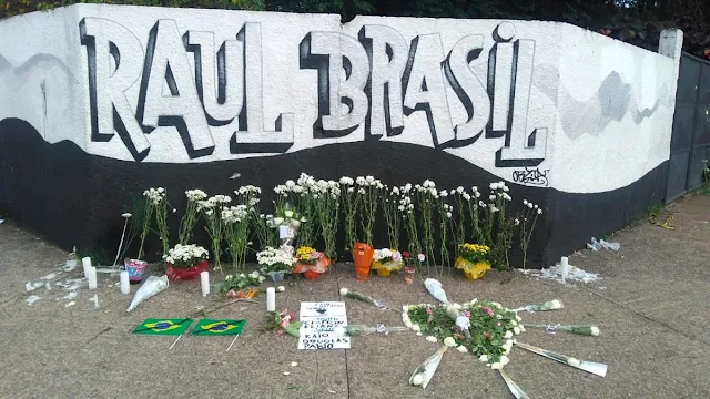 Image Attribute: Flowers at the mural outside Raul Brasil public school, a day after a shooting in which ten people died /Date: March 14, 2019