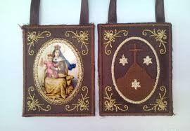 "Hoc erit tibi et cunctis Carmelitis privilegium,   in hoc habitu moriens salvabitur"