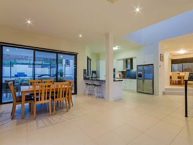 Picture of the dining room and the kitchen interiors