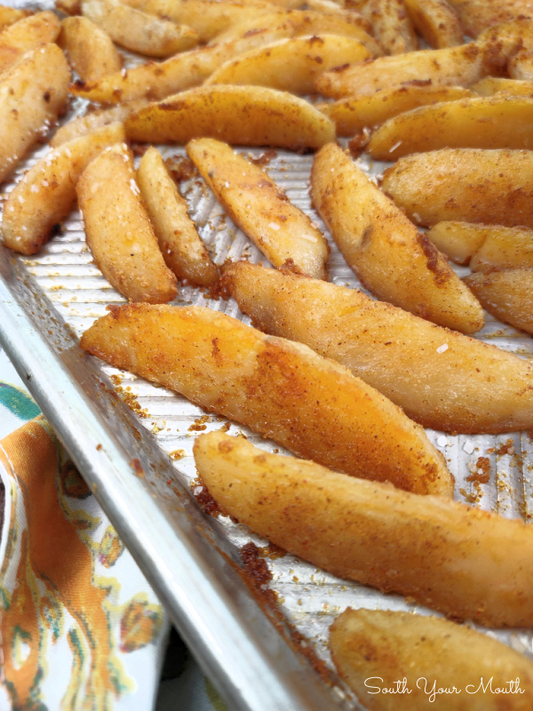 Perfect Roasted Potato Wedges! A fool-proof recipe for baked potato wedges that are crispy and crackly on the outside with fluffy, flavor-packed insides and the cooking technique that gets you both!