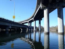 Seattle Freeways cross above the water, casting reflections, Nigel Foster reflections suggest concrete underwater structures, Nigel Foster