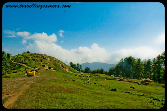 Wonderful trekking experience of Bijli Mahadev @ Kullu-Manali, Himachal Pradesh : Posted by VJ Sharma at www.travellingcamera.com :Last year when I went to Kullu Manali with my college friend, Bijli-Mahadev is the place I liked the most. Its a wonderful place on hill top from where whole Kullu Valley, Manikaran, Malana, Bhuntar and bunch of Apple Orchids can be seen... Here are few views of Bijli Mahadev...Here is the very first view on reaching Bijli Mahadev... You are seeing a yellow path on right side of the photograph, which is a road connected through some small villages and apple orchids... It connects this Bijli Mahadev with Naggar... This road is not recommended if there are rains or probability of rains...Here is the road I was talking about... It a nice walk from Bijli Mahadev...but don't go far..A view to hills in parallel with clouds...Photograph clicked while coming back towards Bijli Mahadev from that road which connects it with Naggar...Few local people sitting on an edge of Bijli Mahadev which is giving a view of Malana Village and Kasol region...Other side of Bijli Mahadev which has dense forest of Deodars on a steep hill...Friends walking around Bijli Mahadev and enjoying the chilly/fast winds here...Radio Transmission Anteena near Bijli Mahadev Temple...A view of Beas River and Bhuntar Airport from Bijli Mahadev...Closer view to Bhuntar airport from Bijli Mahadev @ Kullu, Himachal Pradesh, INDIA...A closer look to Manali Highway and green fields around it... This has been shot from a an edge of Bijli Mahadev...Closer view to Beas River from Bijli Mahadev @ Kullu, Himachal Pradesh, INDIA...Another shot of Kullu Valley from Bijli Mahadev... Here we can see Beas river flowing on one side of Bhuntar airport...Eagle flying on top of Kullu but still at lower heights as compared to Bijli Mahadev...See this man standing on the edge @ Bijli Mahacdev, Kullu, Himachal Pradesh... Its very surprising to see these cattles having their food with very easy walk on these steep hills...It was lovely experience under clouds with cool winds and having amazing views on three sides... Views to Kullu Twon, valley, Apple Orchids, Bhuntar Airport, Beas river, Malana, Manikaran and Kasol Region...