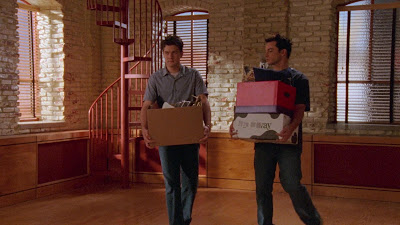 Pacey and Jack sadly walking out of their fancy two storey apartment with boxes in hand