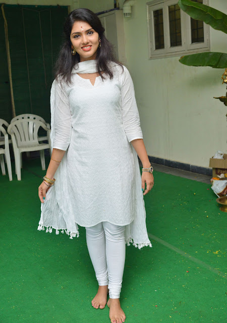 Gayathri Suresh shines in white, exuding charm and grace in her latest cute stills.