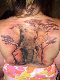 Large Elephant and Tree Tattoo on Girls Back