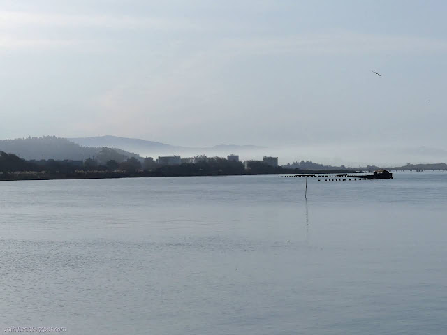 more pylons and buildings in the distance