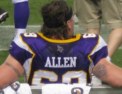 view of the back of Jared Allen and his tatoos 