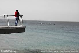 Man Standing at the Bridge