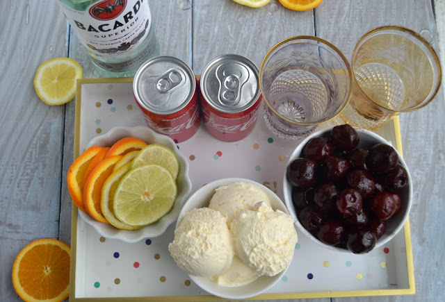 Make Your Own Rum and Coke Bar is perfect for entertaining and is very simple to put together with rum, Coke, lime, lemons, orange slices, cherries and vanilla ice cream! www.nutritionistreviews.com