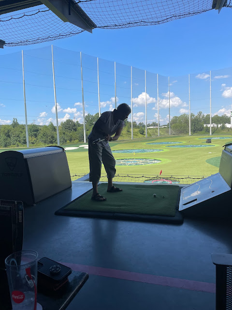 Nana taking a swing at Top Golf