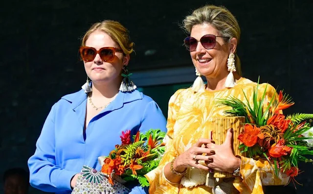 Queen Maxima in Zimmermann dress, Johanna Ortiz earrings. Princess Amalia in Mercedes Salazar earrings, Sarah bag