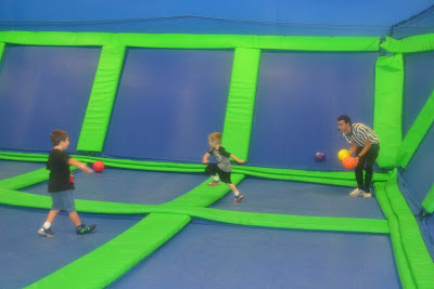 Kids Playing Dodge Ball On Trampoline