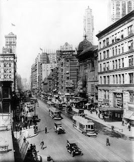 Broadway north from 38th St., New York City, showing the Casino and Knickerbocker Theatres, a sign pointing to Maxine Elliott's Theatre, which is out of view on 39th Street, and a sign advertising the Winter Garden Theatre, which is out of view on 50th Street.