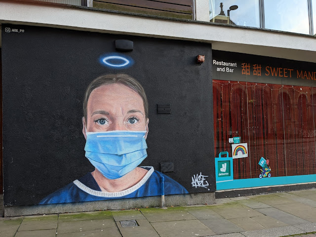 Mural of a nurse in mask in Northern Quarter