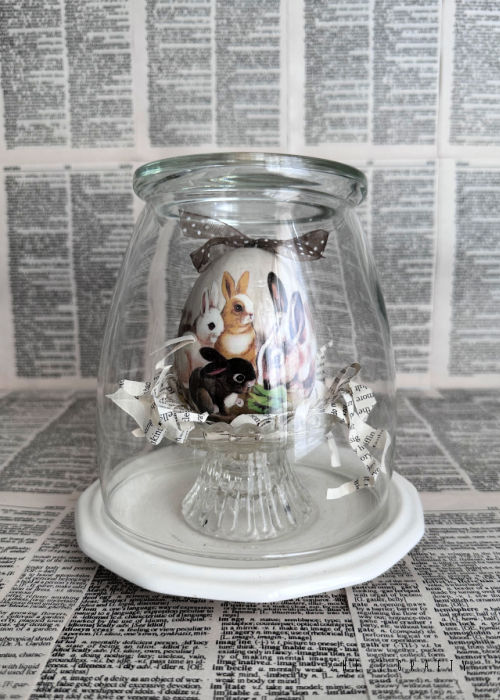 Egg Cloche for Easter covered with a vase.