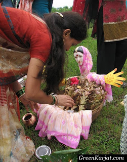 woman worshipping goddess gauri