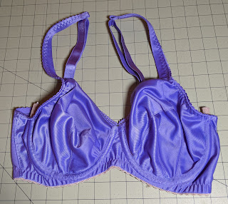 Lavender underwire bra (front) on grid cutting mat