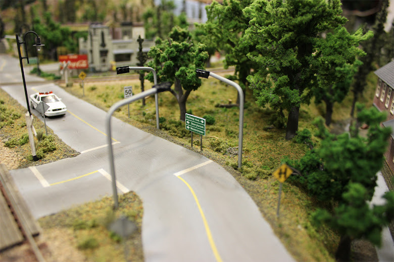 Plaster roads complete with working traffic lights, street lamps, and detailed road signs printed on photo paper