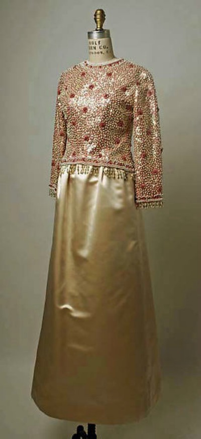 Long evening gown by Yves Saint Laurent for Fall/Winter 1962/63 displayed on dress form