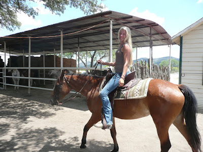 Alison riding Princess Princess sniffing Michael 39s hatPew