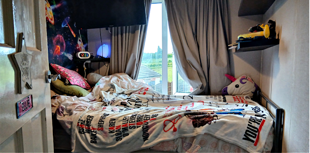 The shortened bed back in youngest girls room