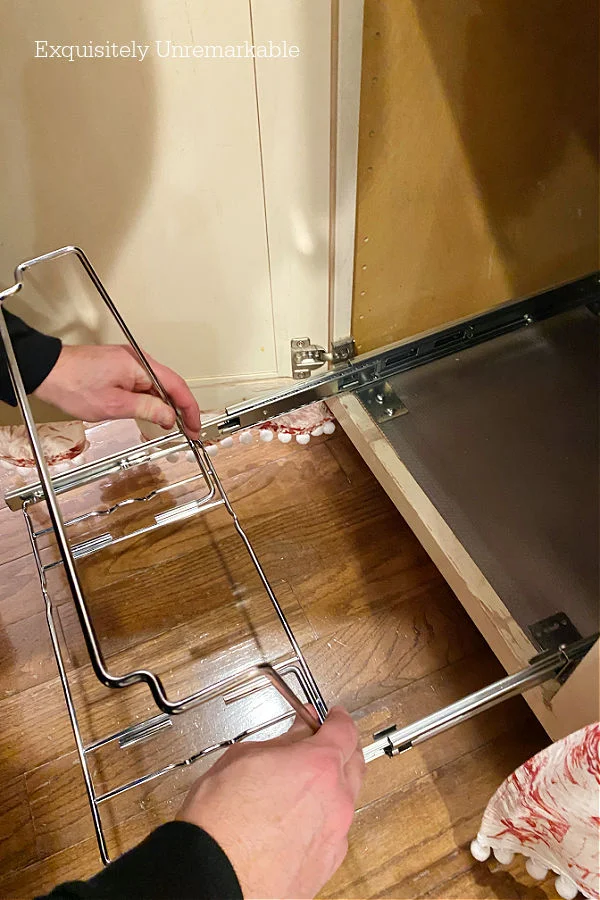 Installing a Rev-A-Shelf under sink kit.