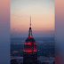 Empire State Building displayes a red and white siren light during the COVID-19 pandemic