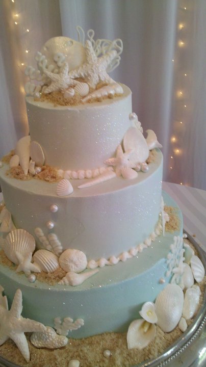 Everything on this Beach themed wedding cake is 100 Ediblethe shells 