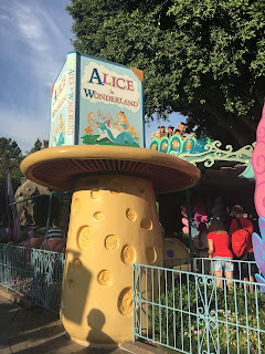 Alice In Wonderland Ride Mushroom Sign Disneyland