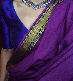 Blue blouse contrasted with violet sari