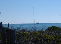 View Oak Island NC photos of the ocean and fishing boats