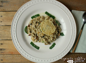 A serving of Gluten Free Mushroom Risotto with Parmesan Crisp and Sage Oil | Anyonita Nibbles