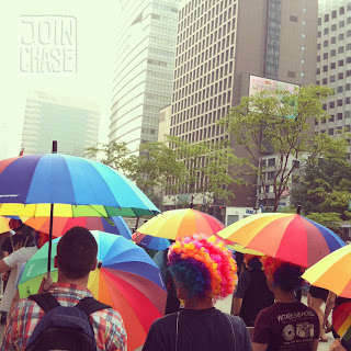 Lots in rainbow umbrellas at the 13th Queer Festival in Seoul, South Korea.