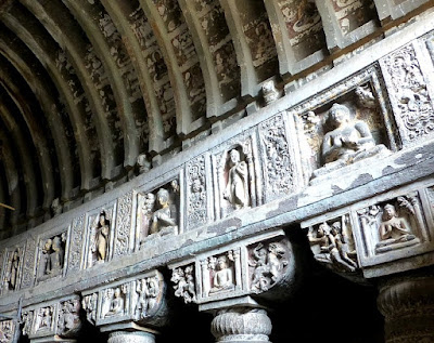 Pillar frieze showing various Buddha sculptures in panels